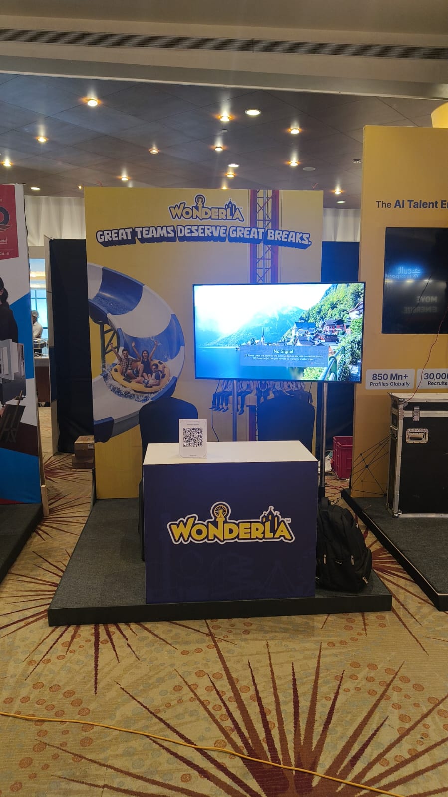 brand activation booth with promoters, counters and visitors